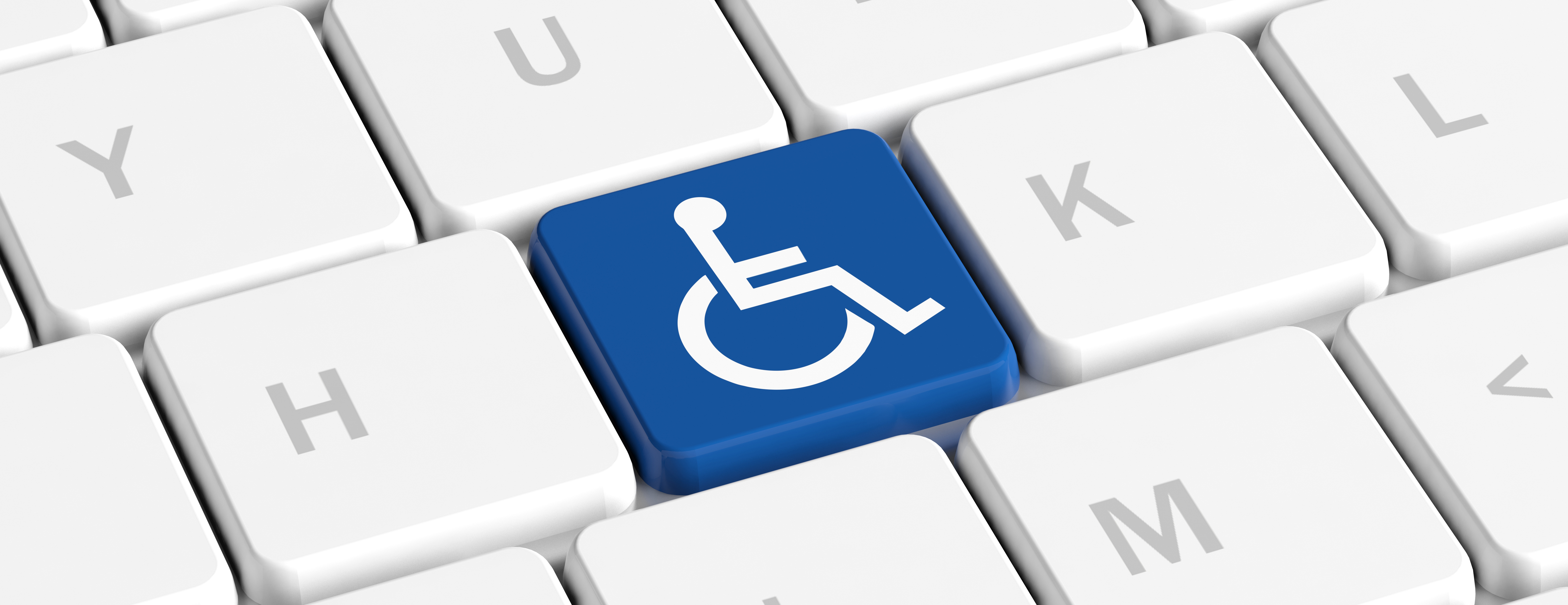 White Computer Keyboard with gray letters and 1 blue key with white wheel chair icon.